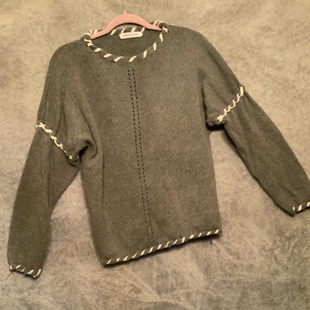 Adorable sweater fits like medium